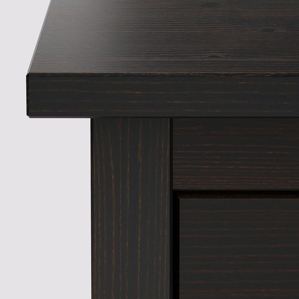 Dark wooden furniture close-up, showing smooth, glossy finish and clean, straight edges, highlighting quality craftsmanship.