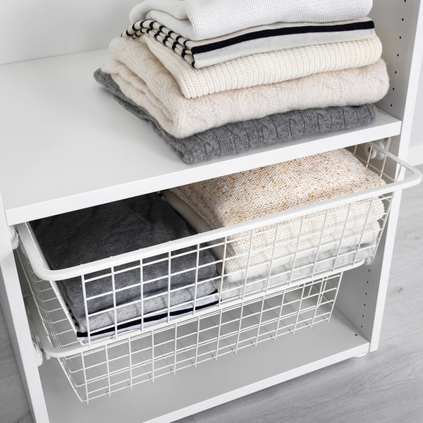 Wire basket with folds trousers, organised textiles in wardrobe, HJÄLPA system.