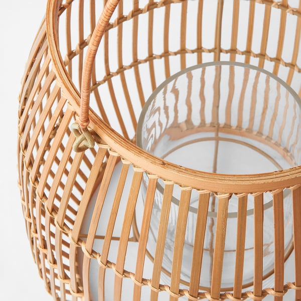 Handwoven bamboo lantern with intricate design, showing craftsmanship and natural texture. Glass tube inside, perfect for candle or led light.