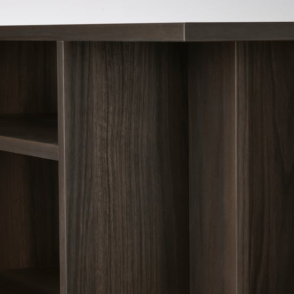 Dark wood shelf with visible grain texture.