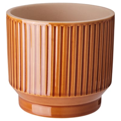 Ribbed brown ceramic planter.