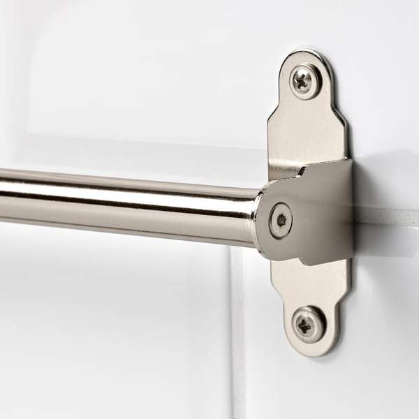 Chrome towel rail securely mounted on wall.