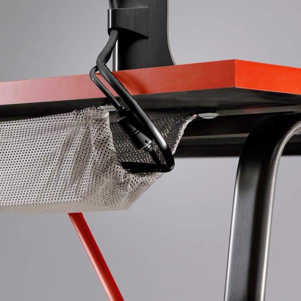 Gaming desk with headphone hook and cable management.