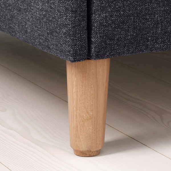 Upholstered bed with solid wooden leg. Soft fabric, sturdy support, quality design.