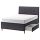IDANÄS dark grey upholstered bed with sloped headboard, wooden legs, and two drawers for storage.