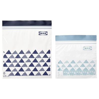 Two ikea ISTAD bags, one clear with blue triangles, one light blue with house design, sealer top, transparent.