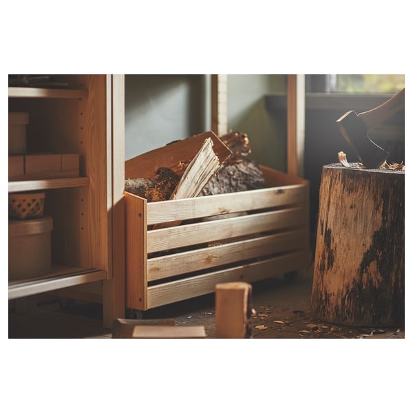 Wooden IVAR storage crate with logs, shelves, and chopping block.