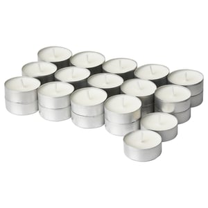 Group of white tea light candles, cylindrical shape, silver aluminium holders.