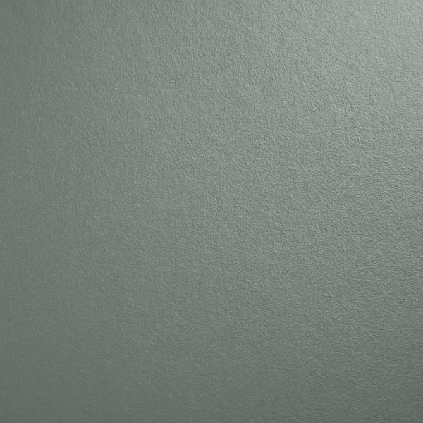 Smooth, sleek, modern teal surface, likely a laminate worktop, showcasing its clean and well-maintained texture.