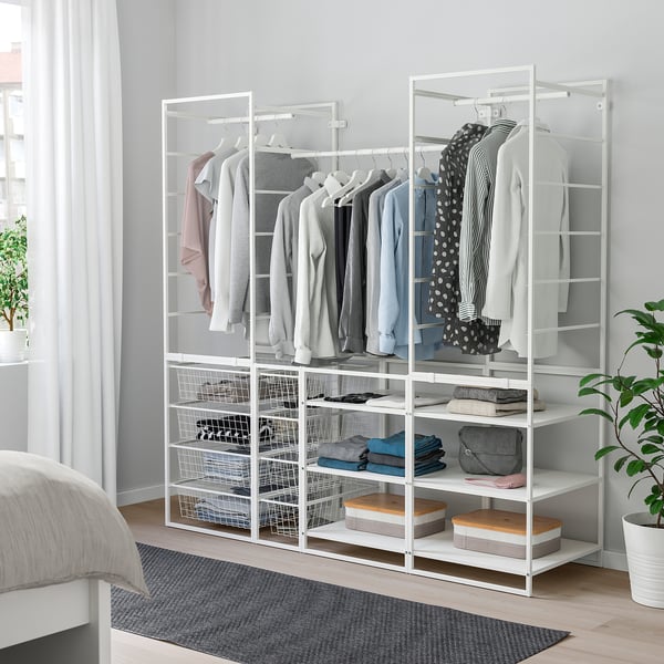 JONAXEL wardrobe: white hanging/shelf storage for clothes and accessories, utilising a corner, featuring multiple rails and shelves with baskets.