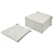 Image shows stack of 5 white JUSTINA chair cushions, rectangular, padded, with loop fasteners.