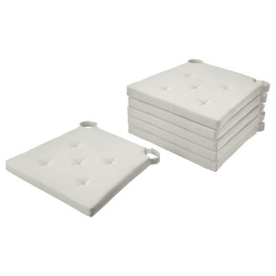 Image shows stack of 5 white JUSTINA chair cushions, rectangular, padded, with loop fasteners.