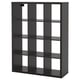 A black ikea KALLAX shelving unit, rectangular in shape, with multiple empty compartments for storage.