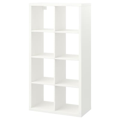 White KALLAX cube bookshelf with open compartments for storage.