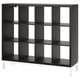 Black KALLAX shelving unit with white legs, modern design and open compartments.