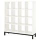 A white KALLAX shelving unit with a black metal base. It a 5x5 grid of cube shelves, great for storage and display.