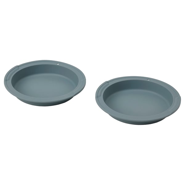 Two round blue silicone baking moulds, dishwasher safe, ideal for cakes, desserts, and omelettes.