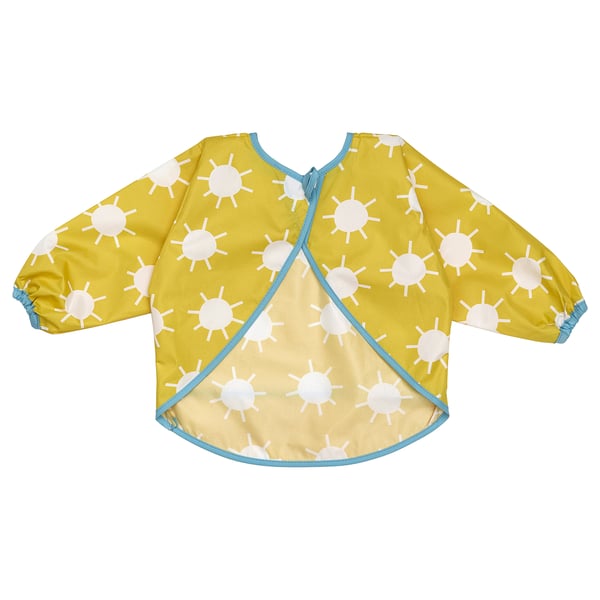 A yellow childrens bib with white sun designs, long sleeves, and a front pocket. Its made of polyester and blue trim.