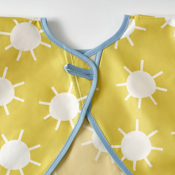 Bright yellow bib with white sun prints and blue trim, quality stitching, secure fasteners.