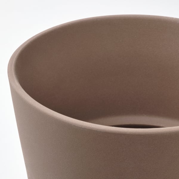Large cylindrical indoor/outdoor planter with matte, textured brown glaze, featuring drain holes at base.
