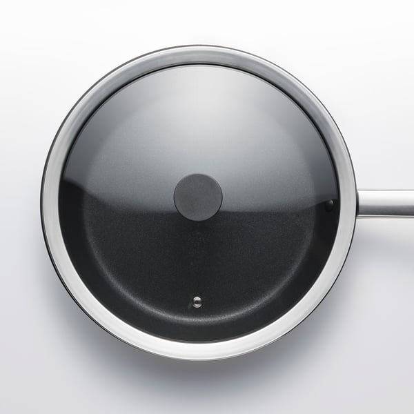 Stainless steel frying pan with tempered glass lid and silicone gasket.