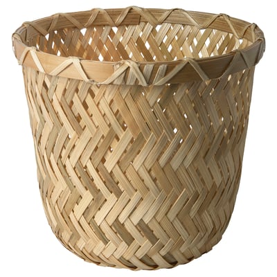 KLYNNON handwoven wicker basket, natural colour, cylindrical shape, intricate diamond design.