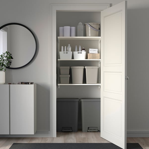 Grey KNÖCKLA bins organise closet, storing tissues, bottles, neat under mirror.