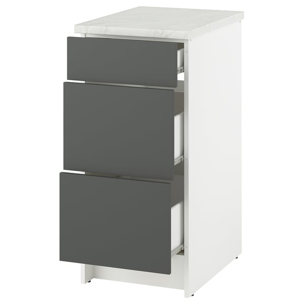 KNOXHULT white base cabinet with 3 dark grey drawers, marble top; modern, organised kitchen storage.