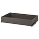 A grey KOMPLEMENT drawer for organising clothes. Its rectangular with smooth edges and a dark, minimalist finish.