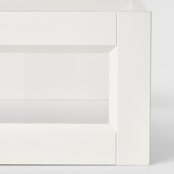 Modern white drawer with glass panel, showcasing sleek design and quality materials.