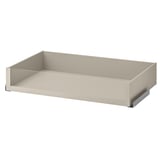 An ikea KOMPLEMENT drawer in beige with a glass front, offering organizer storage.