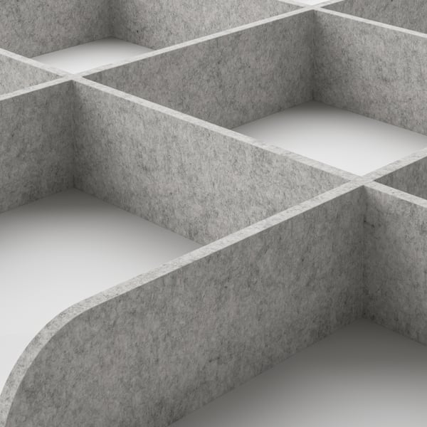 Close-up of grey wardrobe organiser trays. Smooth, durable surfaces with curving edges. Stacked trays show robust, high-quality construction.