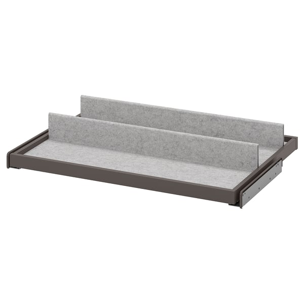 KOMPLEMENT pull-out tray: grey felt, black trim, rectangular, simple design.