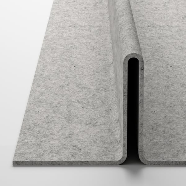 Grey fabric tray with curved edge, part of a storage system, soft close feature.