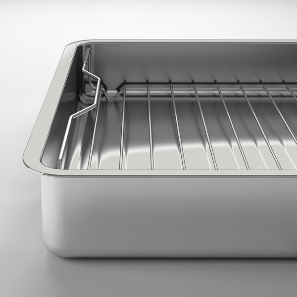 Stainless steel roasting tin with grill rack, durable quality.