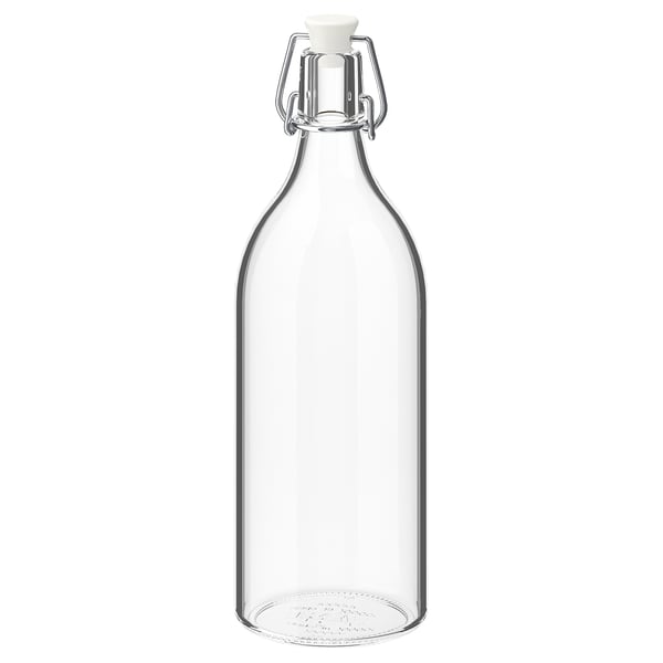 KORKEN: clear glass bottle with silver wire clamp and white stopper.