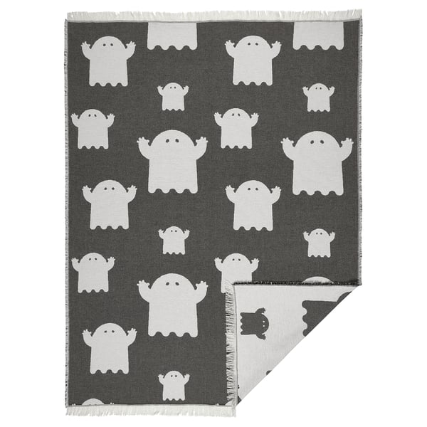 KUSTFYR throw blanket, black & white ghostly design on soft cotton, rectangular with fringes.