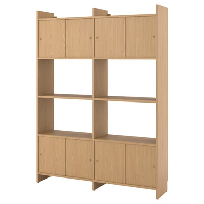 An LÅDMAKARE light wood storage unit with open shelves and cabinets. It has a sleek, airy design suitable for various spaces and styles.