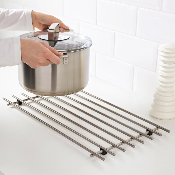 Protecting counter with trivet.