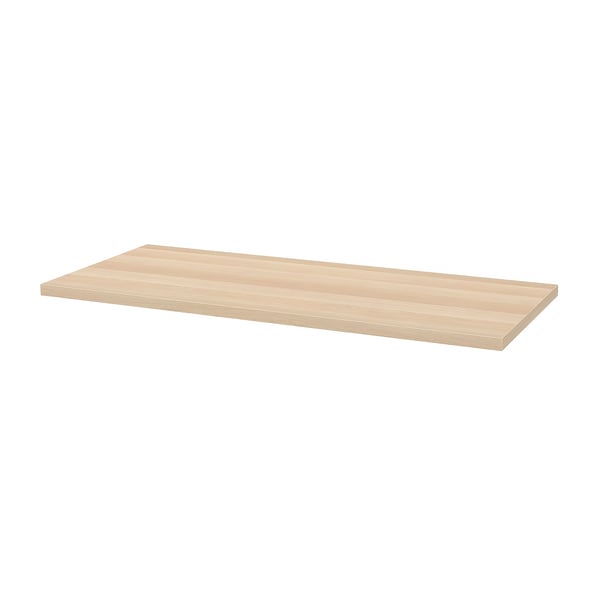 A light wood-colored rectangular table top by IKEA. It is simple and modern, perfect for various furniture combinations.