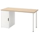A LAGKAPTEN desk in light oak and white. It has a simple, rectangular shape with a single cabinet for storage. The design is modern and functional.