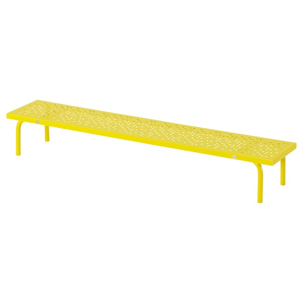 Bright yellow metal desk shelf with perforated surface, four supportive legs, rectangular shape.