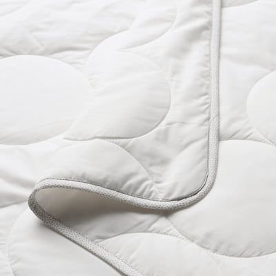 Clean, white duvet with even stitching and soft, plush texture. Border has a subtle patterned trim.