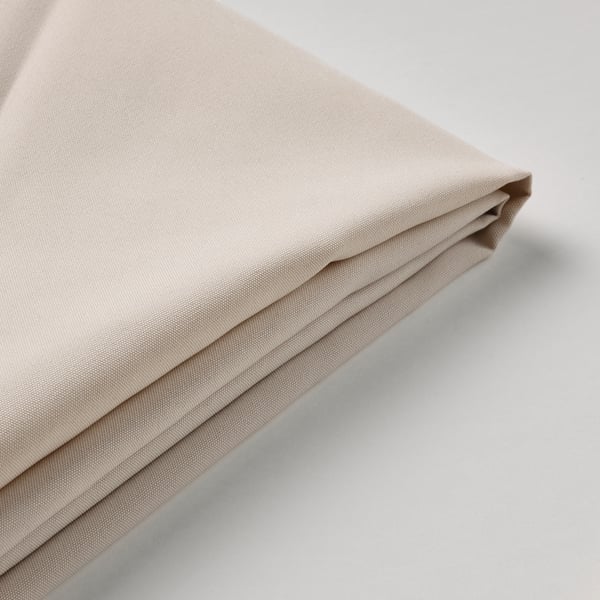 Folded beige fabric, neatly stacked, likely high-quality uv-resistant polyester.
