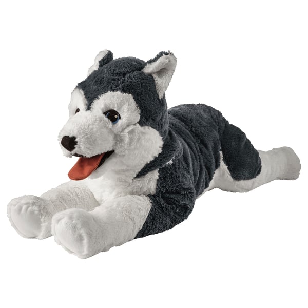 Plush grey and white husky dog toy, lying down, soft fabric, bright blue eyes, friendly face.
