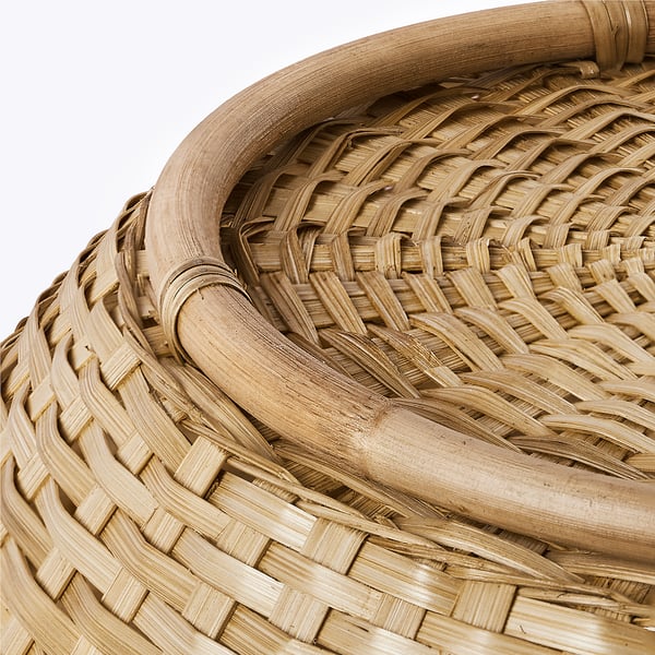 Handwoven bamboo basket, showcasing intricate craftsmanship. Sturdy and well-made with visible bamboo strands.