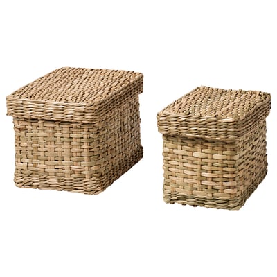 Two handwoven seagrass storage baskets with lids, rectangular, natural colour.