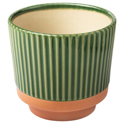 Green textured ceramic planter with plain orange base.