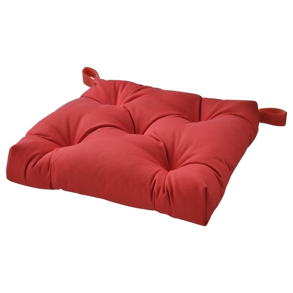 Red cushion pad with two handles, square shape, soft texture.