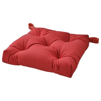 Red cushion pad with two handles, square shape, soft texture.